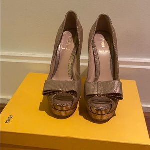 Fendi gold bow platform heels